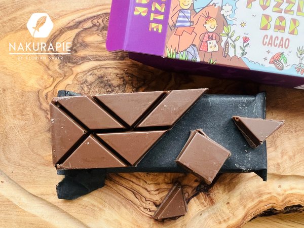 Muttischoki mit Kakao - Kakao Dattel Riegel 30g - Puzzle Bar mit Spirulina & Antioxidantien